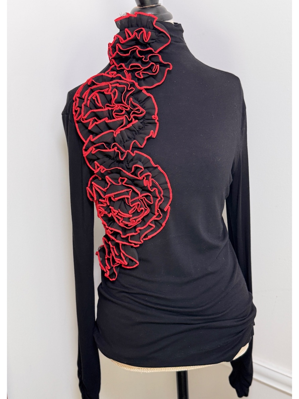 Black Long-Sleeve Top with Red Ruffle Rosette Accents